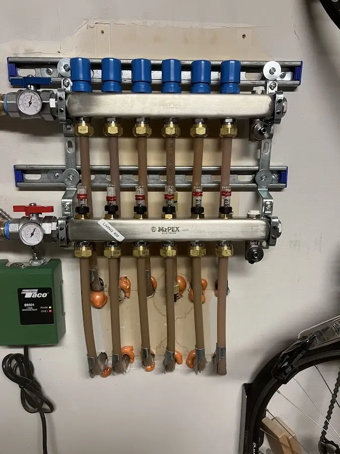 Plumber performing Water Heater Repair at a residential property in Glenburn